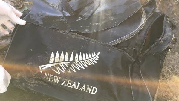 The puppies were found in this black bag on a bank of the Waikato River, just south of Waiuku. Picture: NZ Herald/SPCA