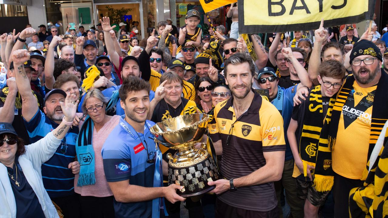 SANFL Captains James Battersby (Sturt) and Max Proud (Glenelg) with the Premiership Cup and fans in Rundle Mall. Picture: Brett Hartwig