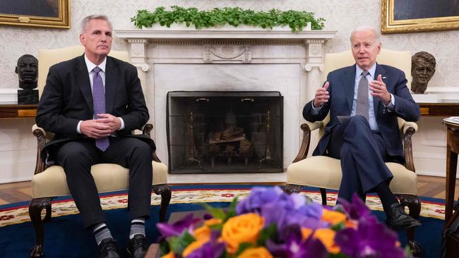 US House Speaker Kevin McCarthy looks on as Joe Biden speaks during a meeting on the debt ceiling. Picture: AFP.