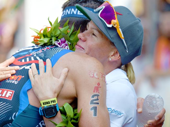 Mirinda Carfrae hugs husband Tim O'Donnell at the end of the 2015 race in Hawaii.