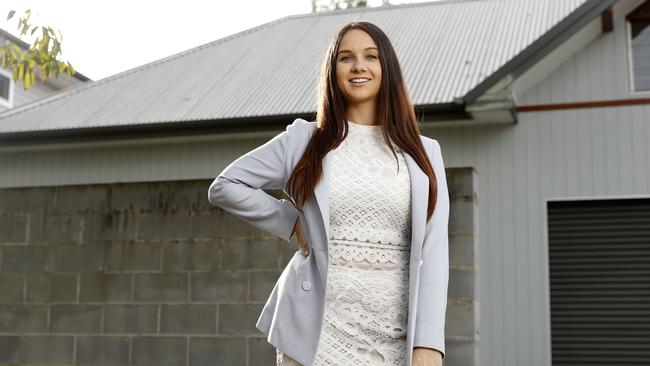 Ashley van Deyk 25, is looking to buy her first home but is struggling. Picture: Tim Hunter.