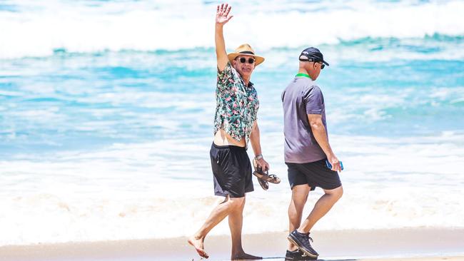 Actor Tom Hanks went for a walk along the beach near Broadbeach at midday on Friday. Picture: Nigel Hallett