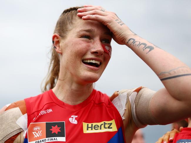 BRISBANE, AUSTRALIA - NOVEMBER 27:  Tayla Harris of the Demons celebrates winning the AFLW Grand Final match between the Brisbane Lions and the Melbourne Demons at Brighton Homes Arena on November 27, 2022 in Brisbane, Australia. (Photo by Chris Hyde/Getty Images)