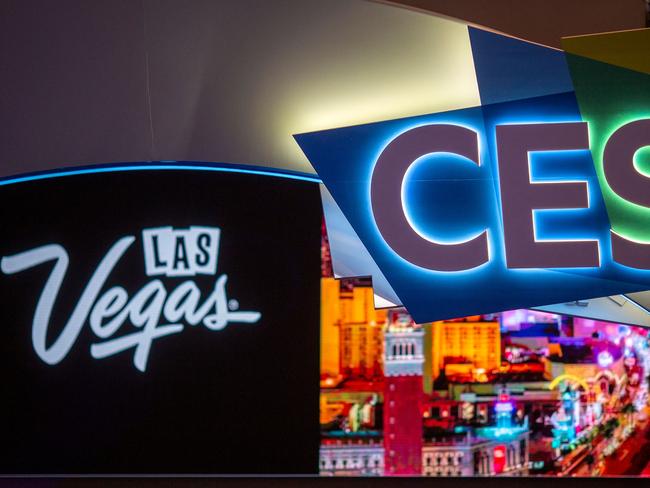 (FILES) In this file photo taken on January 8, 2019, the CES logo is seen inside the Las Vegas Convention Center during CES 2019 in Las Vegas. - Multiple major companies have announced they will cancel or limit their attendance to the 2022 Consumer Electronics Show (CES) -- the tech industry's annual mass-gathering in Las Vegas -- due to Covid-19 variant Omicron's rapid spread. The popular four-day conference, which had planned for a grand return in 2022 with in-person attendance, is still scheduled to start on January 5, with the press getting early access two days beforehand. (Photo by DAVID MCNEW / AFP)