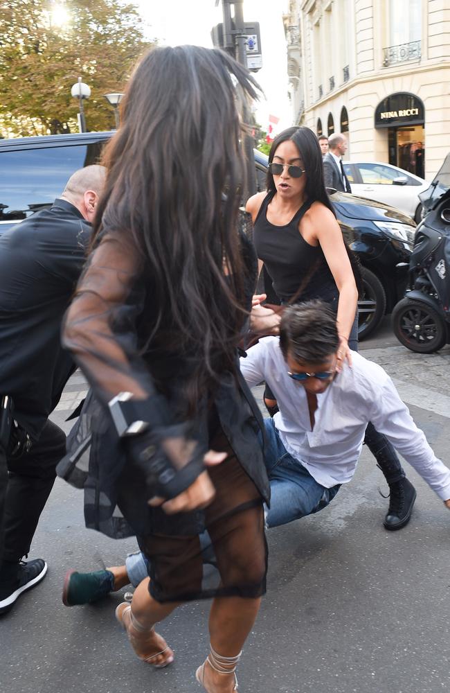 Bodyguard Pascal Duvier and assistant Steph Shep protect Kim Kardashian as she is targeted by Vitalii Sediuk in Paris. Picture: Splash