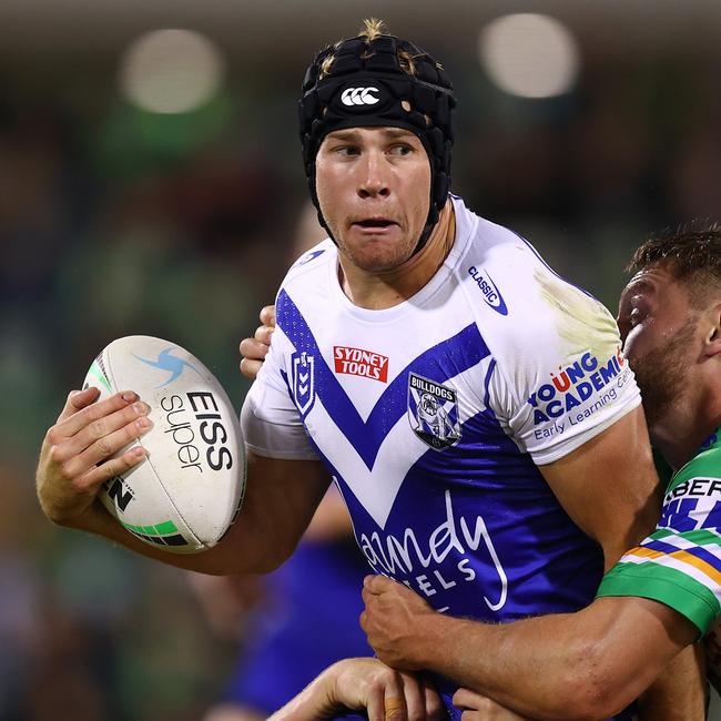 Matt Burton getting paid unders and losing games at the Bulldogs. Picture: Mark Nolan/Getty Images