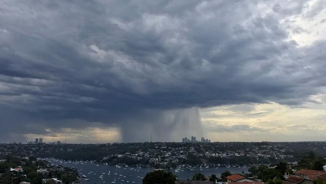 A large storm seen passing over Sydney on Monday afternoon. Picture: Ian Gilchrist