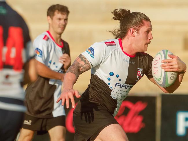 Isaac Taulelei in Darwin Rugby Union's A-grade Round 2 match  Casuarina Cougars v University Pirates.Picture GLENN CAMPBELL