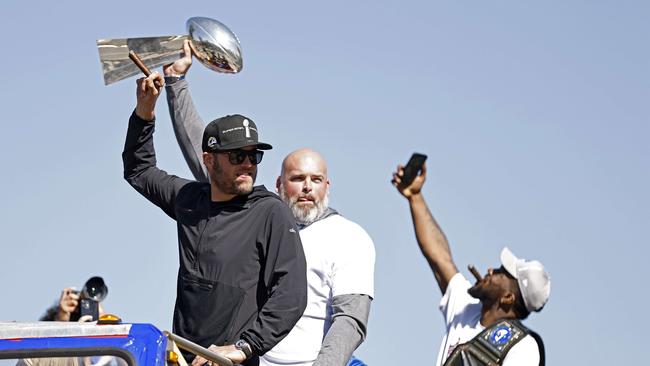 Matthew Stafford (L) raises a cigar to the crowd of Rams supporters. Picture: Getty