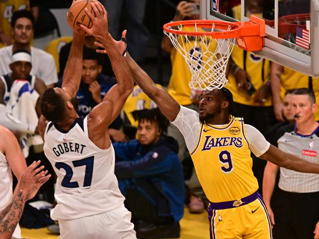 Lakers guard Bronny James jumps to block a shot by Timberwolves' centre Rudy Gobert. Picture: AFP