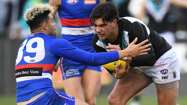 Riley Bonner of the Power (right) and Jason Johannisen of the Bulldogs during the Round 19 match in Ballarat. Picture: AAP Image/Julian Smith