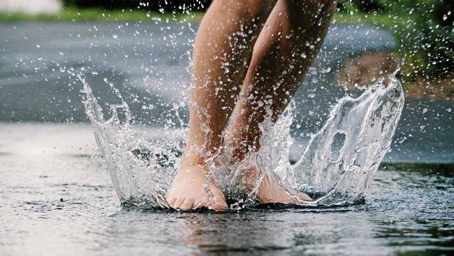 According to BOM Stanthorpe is unlikely to see another downpour any time soon.A child splashes in a puddle. Picture: Noelle Otto