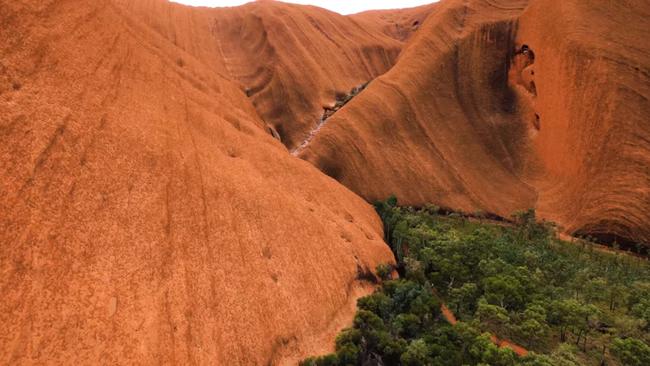 Most of us have never seen the iconic rock like this before. Picture: Voyages indigenous Tourism Australia