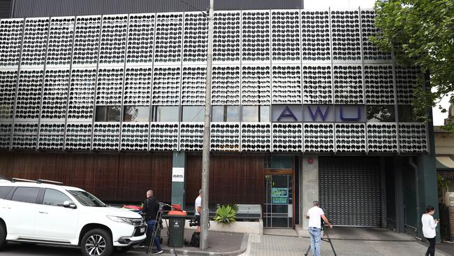 Australian Federal Police officers raid the offices of the AWU on Spencer Street. Picture: Aaron Francis/The Australian