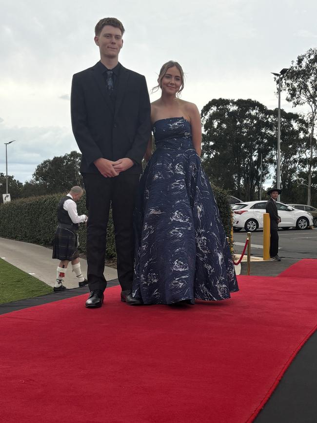 The students of Urangan State High School arriving at their formal.