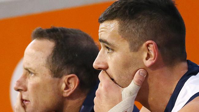 Adelaide coach Don Pyke and skipper Taylor Walker on the bench during the Crows’ disastrous third quarter. Picture: Michael Klein