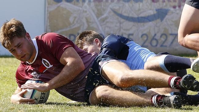 QLD Reds' Xavier Rubens gets over the line for a try. Junior Rugby Union. Under 18s NSW Waratahs v Queensland Reds. Picture: John Appleyard