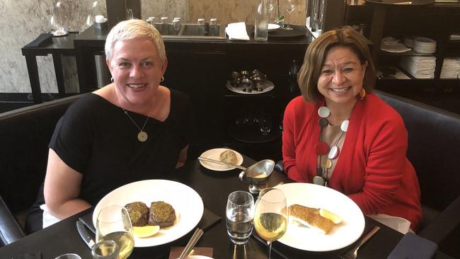 Following her surprise sacking from the ABC Michelle Guthrie (R) enjoys a meal at Rockpool in Sydney with friend Melanie Brock.