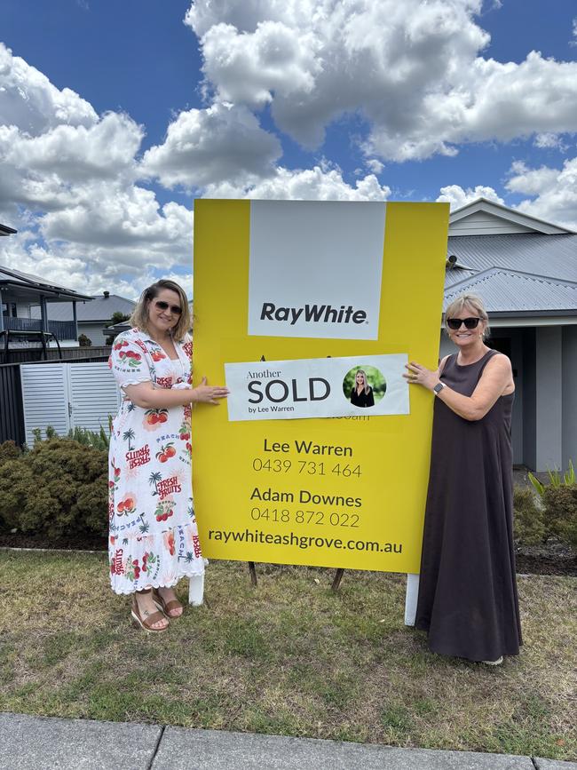 The buyer (left) and seller (right) were both happy with the sale, with the buyers from nearby and the sellers moving closer to the city.