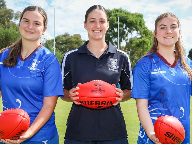 MELBOURNE, AUSTRALIA - APRIL 3 2025Former AFLW player Sarah Sansonetti with students Liana Georgiev and Abbey Mills. Sarah is now a teacher at her former school, Loyola College. Picture: Brendan Beckett