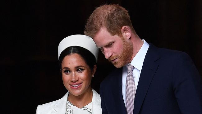 Meghan Markle, pictured with Prince Harry, was convinced she would be as beloved as the late Princess Diana, a new book claims. Picture: AFP