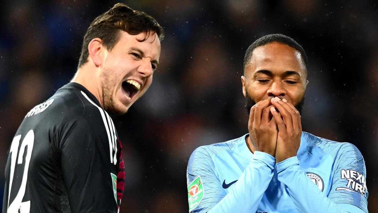 Leicester City goalkeeper Danny Ward of Leicester City celebrates as Raheem Sterling misses a penalty.