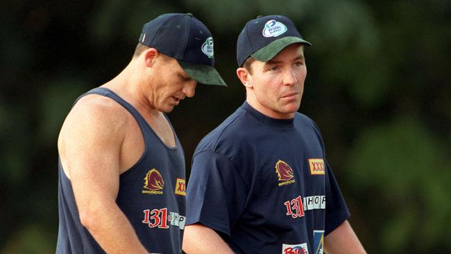 Kevin Walters as captain of the Broncos welcomes Paul Green to the club at a 2000 training session. Picture: David Kapernick