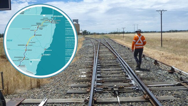 A worker walks the line on the Parks to Narromine section of the Inland Rail.