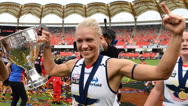 Adelaide Crows co-captain Erin Phillips celebrates winning the AFLW grand final at Metricon Stadium in March.