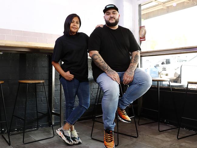 Kat and Gee Ozgen in their hamburger shop Happy Ending but they are restoring their food truck after a fire. Picture: Sam Ruttyn