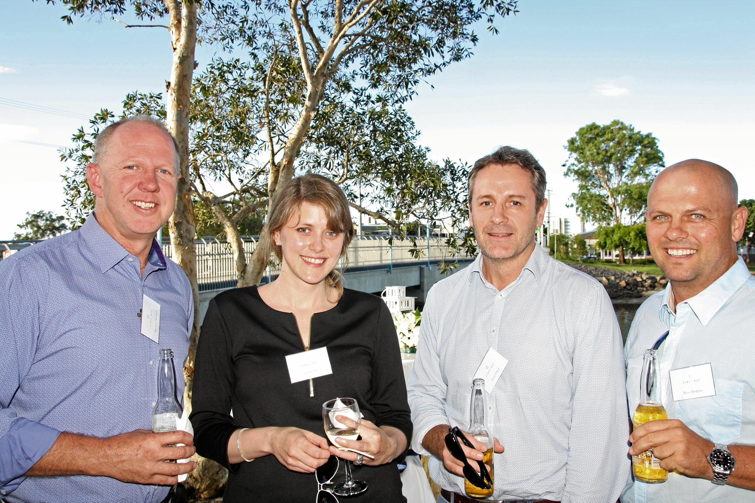 Natalie Lis of Ken Down Architects with Michael Michell, Terry Lloyd and Steve Hodgins of Hutchinson Builders at Mooloolaba to celebrate the launch of the luxury First Bay Coolum development. Picture: Erle Levey