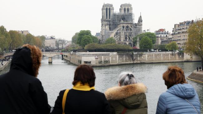 A fire broke out on Monday afternoon that spread across the Cathedral, causing the famous spire to collapse. Picture: Dan Kitwood/Getty