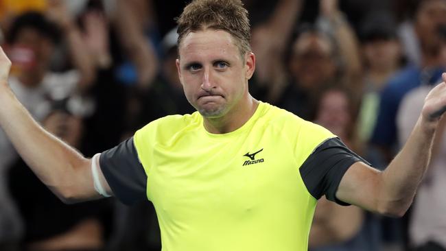 Tennys Sandgren celebrates after defeating Austria's Dominic Thiem. Picture: AP