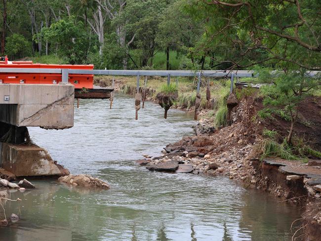 Premier of Queensland David Crisafulli crosser the Ollera Creek which has been destroyed by flood water so he can make his way into Ingham. Pics Adam Head