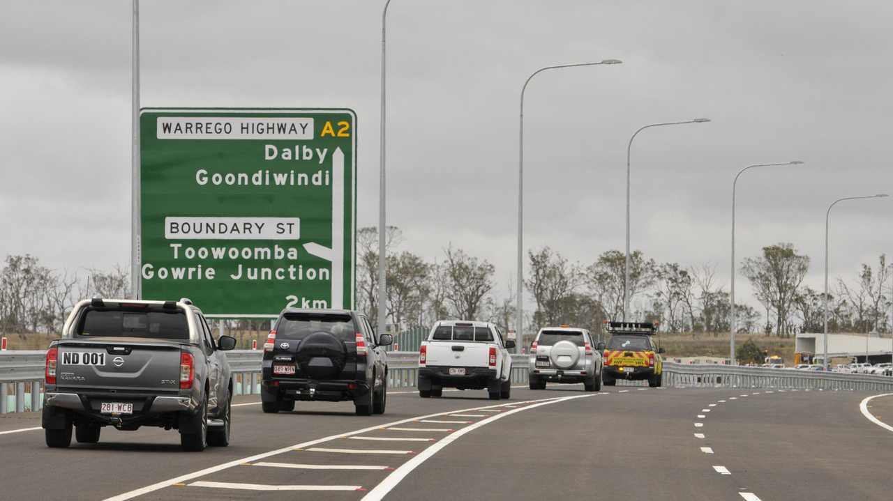 Officials drive in the first convoy of vehicles after the opening of a western section of the Toowoomba Second Range Crossing, Saturday, December 8, 2018. Picture: Kevin Farmer