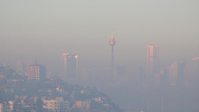 Thick bushfire smoke blankets Sydney on Tuesday. Picture: John Grainger