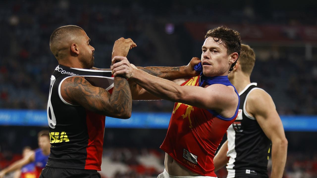 Bradley Hill of the Saints and Lachie Neale of the Lions. Photo by Daniel Pockett/AFL Photos/via Getty Images