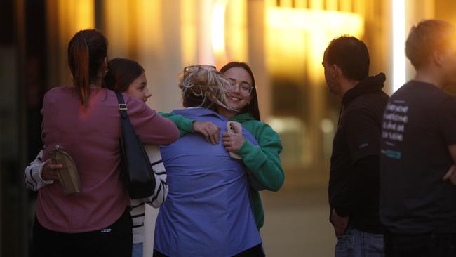 Shoppers react to the chaos. Picture: Brett Hartwig