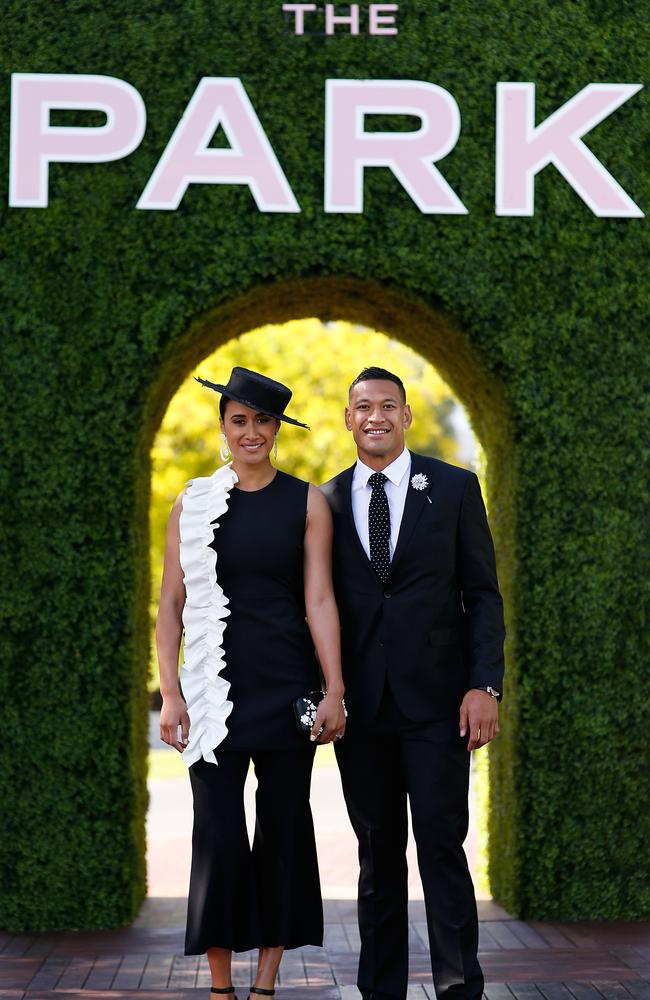 Maria Tutaia and Israel Folau pose at The Park on AAMI Victoria Derby Day at Flemington Racecourse. Picture: Daniel Pockett/Getty Images.