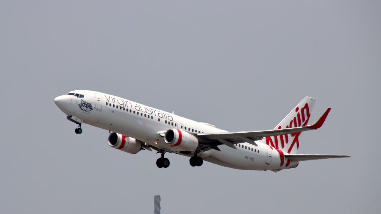 NO HOLDS BARRED: A Virgin Airlines plane depart Brisbane.