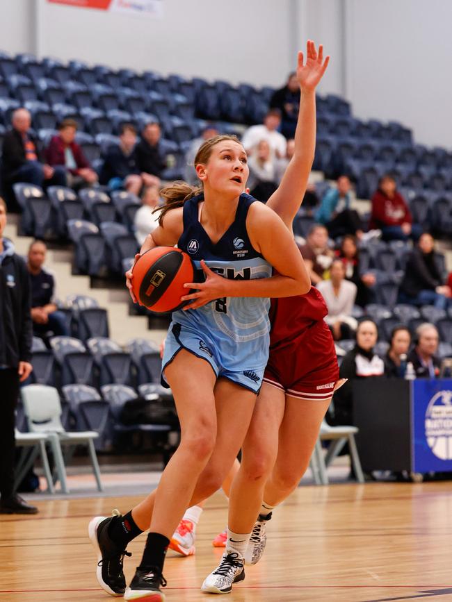 Action from the NSW Metro v Queensland North girls bronze medal match. Picture: Michael Farnell/Sports Imagery Australia