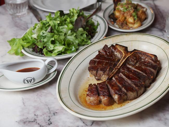 Pictured is the Signature Porterhouse with Green Leaf Salad and Grandads Potatoes. Photo: Tara Croser.