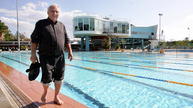 Architect James Birrell getting his feet wet at Spring Hill’s Centenary Pool complex, which he designed.