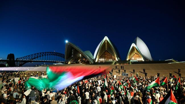 Protesters show their support for Palestinians during a rally in front of the Opera House in Sydney on October 9, 2023. Picture: Izhar Khan / AFP