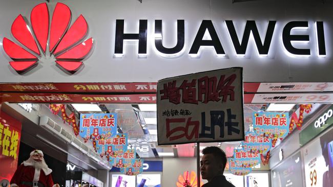 The federal government has banned controversial phone company Huawei. Picture: AP Photo/Andy Wong