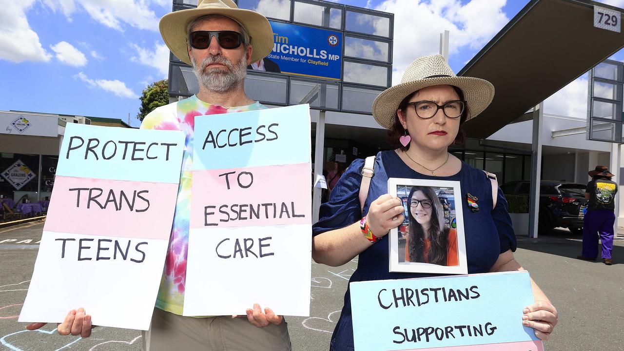 Allan Rae (left) and Sarah Rae (Right) outside Tim Nicholls Electorate office after the decision to stop puberty blockers. Photo: Adam Head