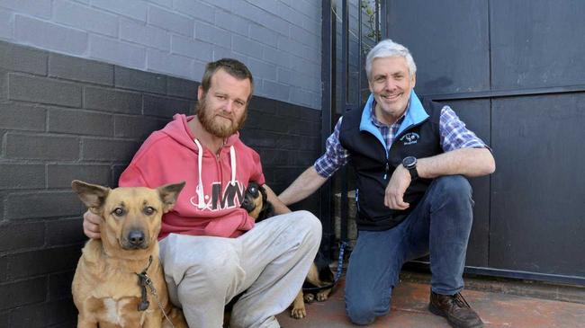 HELPING HAND: Homeless man Robert Muller (left), and his dogs Arasmas and Sophie,  benefited from Dr Paul Sheedy's free homeless pet clinic, held at Base Services, on the second Tuesday of each month. Picture: Michael Nolan