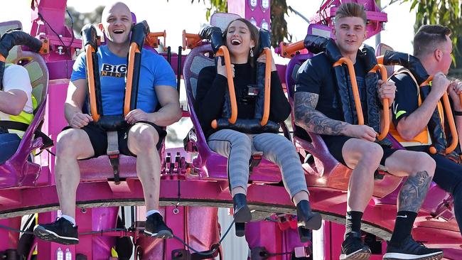 Australian Ninja Warrior contestants Alex Bigg, left, and Nathan Ryles, right, test the Extreme Thriller with <i>Advertiser </i>reporter Dixie Sulda, centre. Picture: Tom Huntley