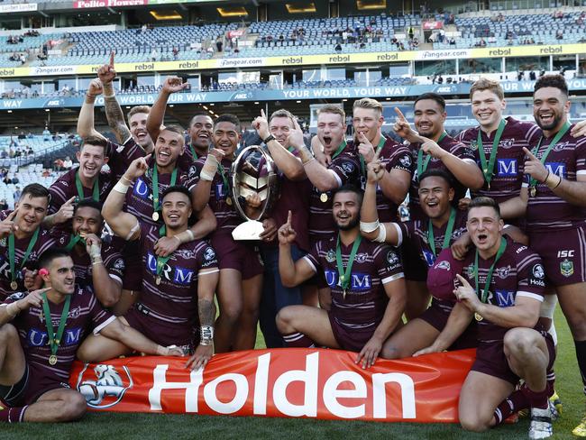 Manly players celebrate victory after the Parramatta Eels v Manly 2017 Holden Cup U20's Grand Final at ANZ Stadium, Sydney. Picture: Brett Costello