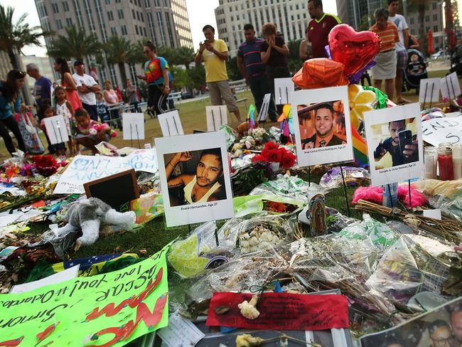 People visit a memorial for those killed at the Pulse nightclub. Picture: Getty Images